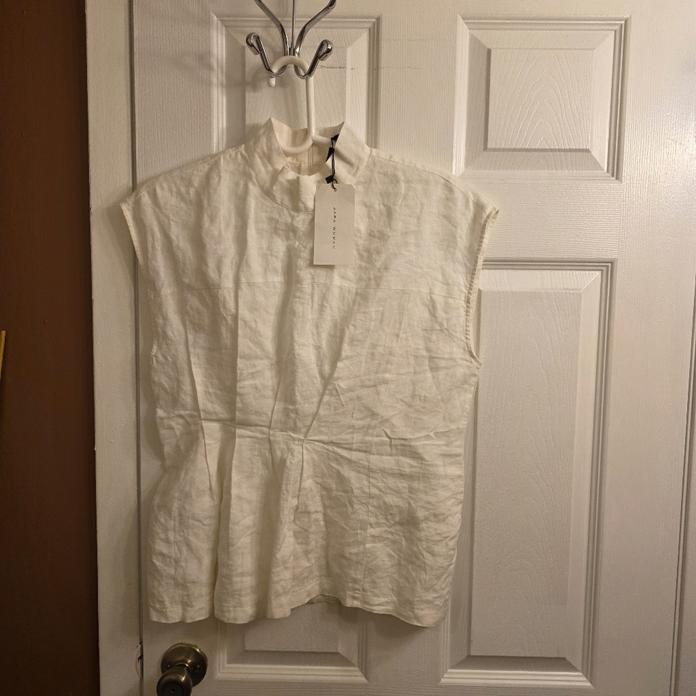 Elegant White Sleeveless Top - Picture 5 of 7